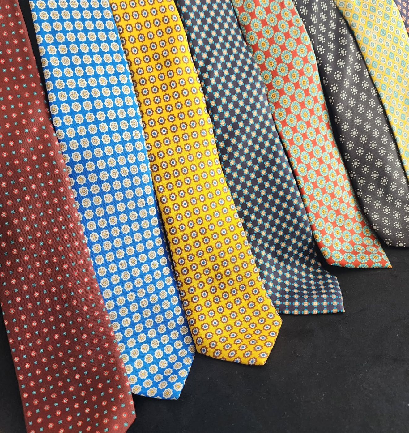 A fan of printed silk ties